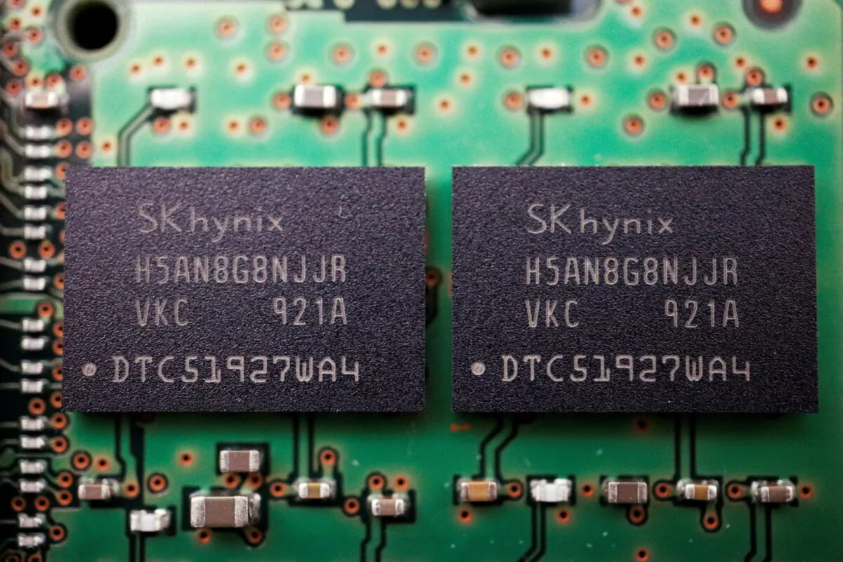 Memory chips by South Korean semiconductor supplier SK Hynix are seen on a circuit board of a computer, on Feb. 25, 2022. (Reuters/Florence Lo/Illustration/File Photo)