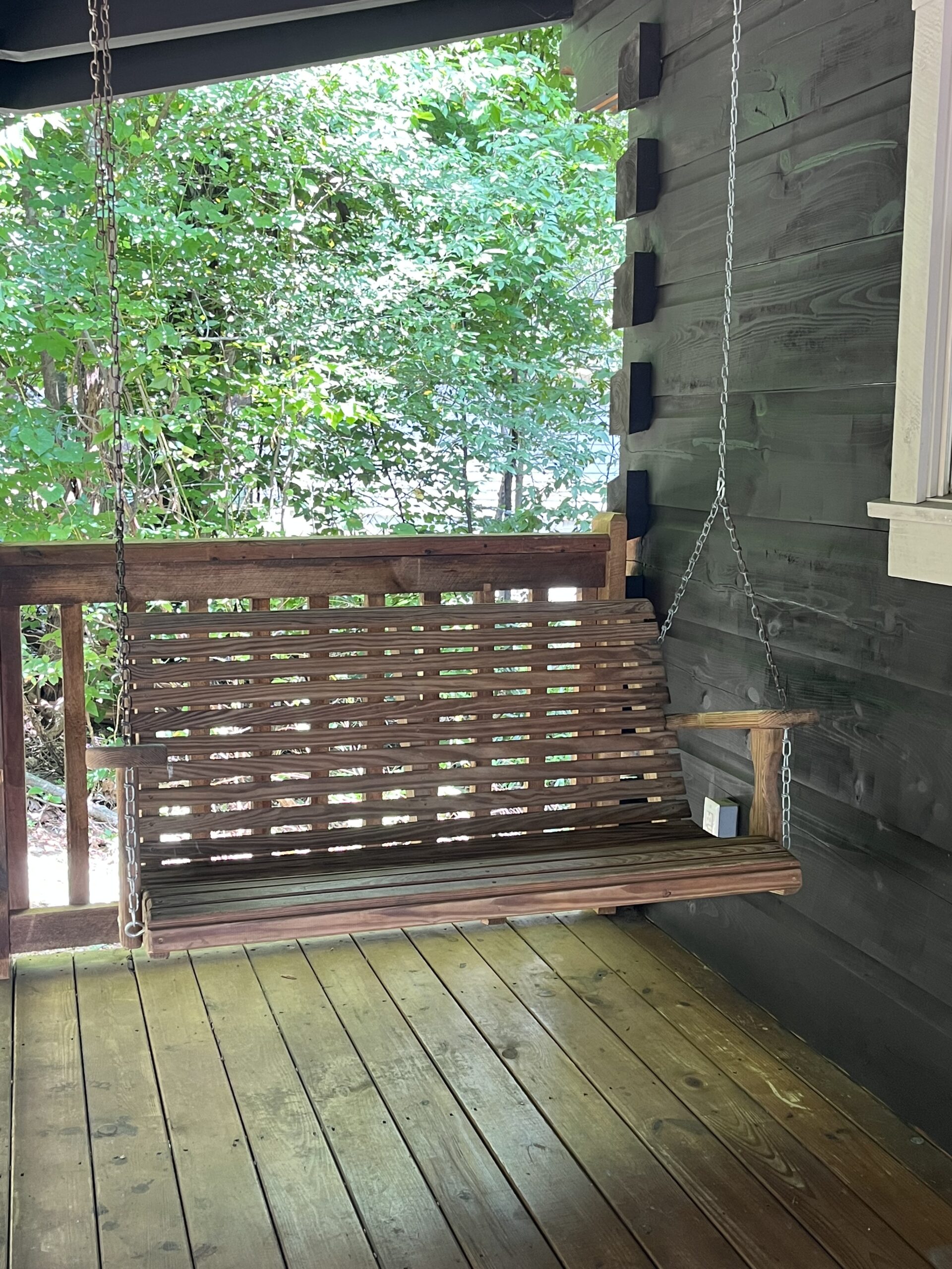Porch swing at Sunrise Woods Retreat 