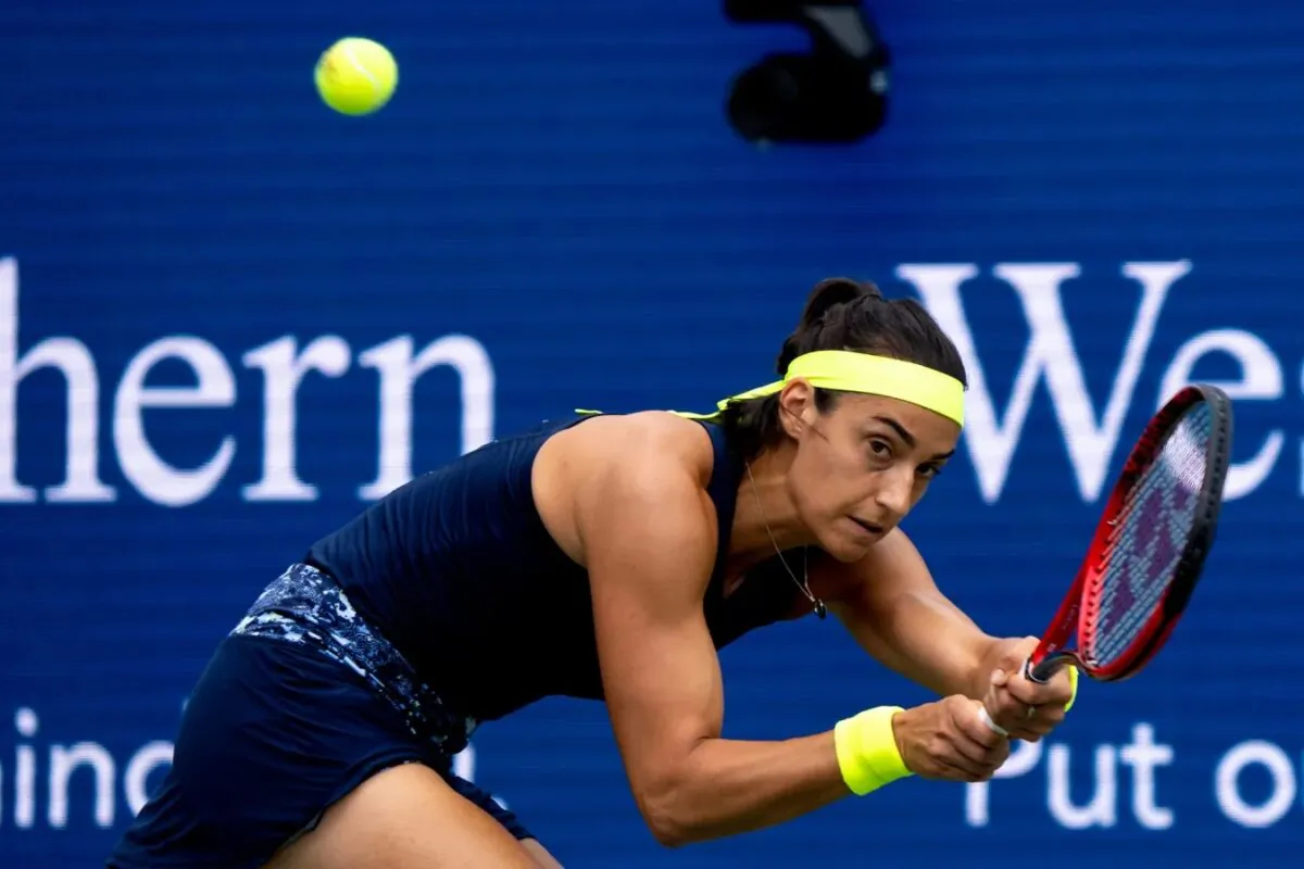 Caroline Garcia returns to Petra Kvitova in the first set of the Western & Southern Open women's final match at the Lindner Family Tennis Center in Mason, Ohio, on Aug. 21, 2022. (Albert Cesare/The Enquirer/USA TODAY NETWORK via Field Level Media)