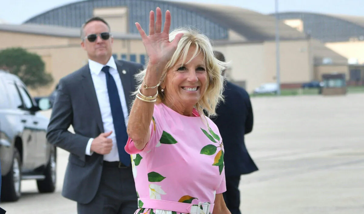 First Lady Jill Biden waves before boarding Air Force One to depart Joint Base Andrews in Maryland on Aug. 10, 2022. (Nicholas Kamm/AFP via Getty Images)