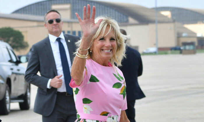First Lady Jill Biden waves before boarding Air Force One to depart Joint Base Andrews in Md. on Aug. 10, 2022. (Nicholas Kamm/AFP via Getty Images)