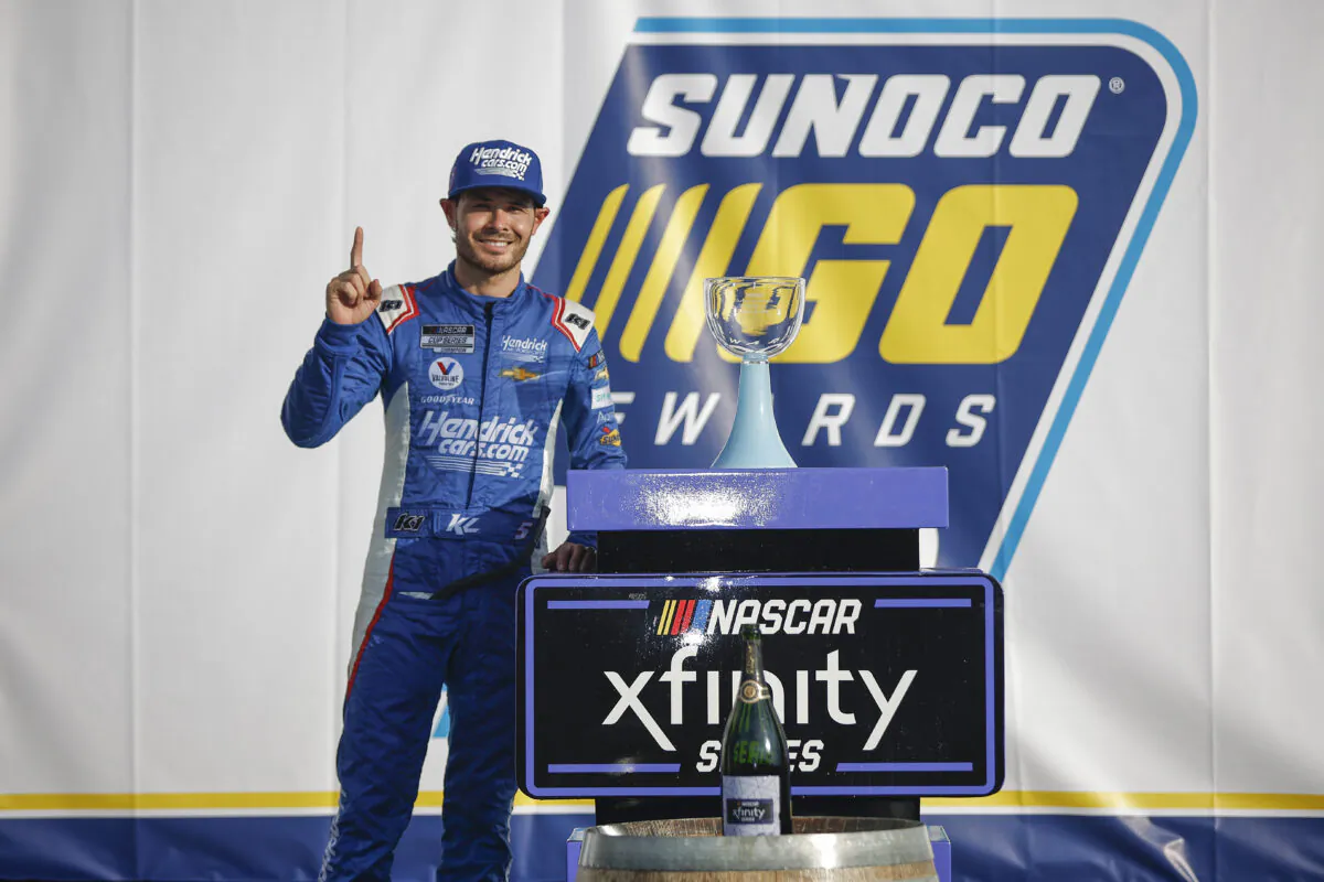 Kyle Larson, driver of the #88 HendrickCars.com Chevrolet, celebrates in victory lane after winning the NASCAR Xfinity Series Sunoco Go Rewards 200 at The Glen at Watkins Glen International in Watkins Glen, N.Y., on Aug. 20, 2022. (Chris Graythen/Getty Images)