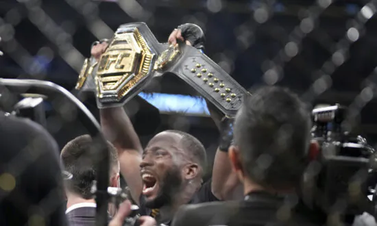 Edwards Stops Usman Late in 5th, Wins UFC Welterweight Title