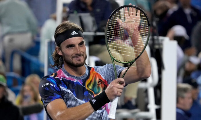 Stefanos Tsitsipas of Greece celebrates after defeating Daniil Medvedev of Russia 7–6, 3–6, 6–3 during the Western & Southern Open at the Lindner Family Tennis Center in Mason, Ohio, on Aug. 20, 2022. (Dylan Buell/Getty Images)