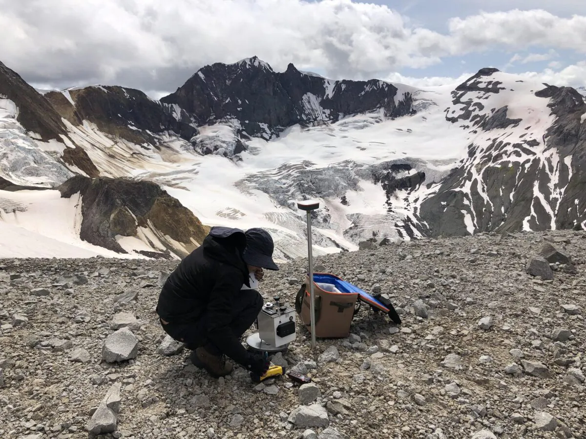 Geologist Antonina Calahorrano sets up a test well to map the region's geothermal possibilities. (The Canadian Press/HO/Natural Resources Canada)