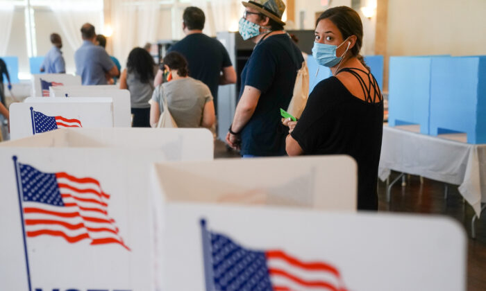 People wait in line to vote in Georgia's Primary Election in Atlanta, Ga., on June 9, 2020. (Elijah Nouvelage/Getty Images)