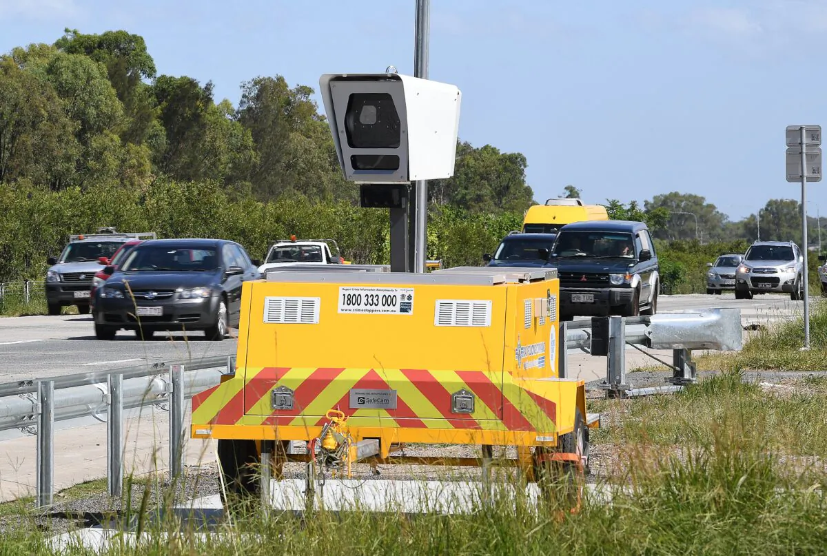 A mobile speed camera is seen on the M1 Motorway south of Brisbane, Australia, Jan. 15, 2018. (AAP Image/Dave Hunt)