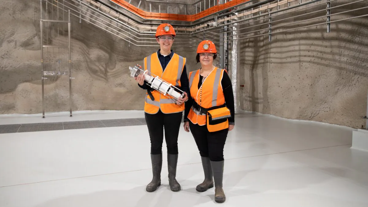 PhD student Madeleine Zurowski with lead researcher Professor Elisabetta Barberio in the Stawell Underground Physics Lab. Image: Olivia Gumienny (Supplied to The Epoch Times)