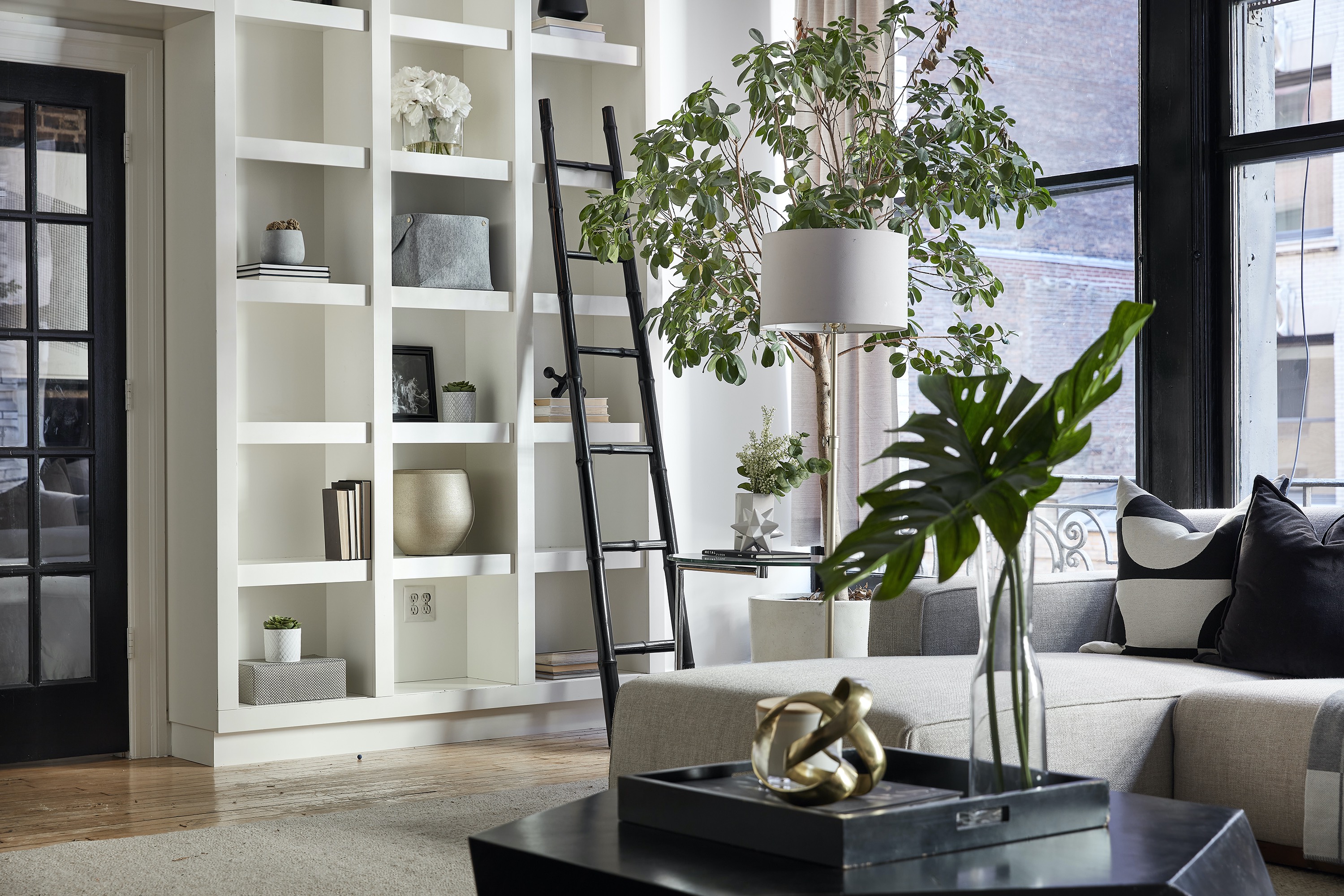 Greenery is used to help incorporate green accents into a living space. 