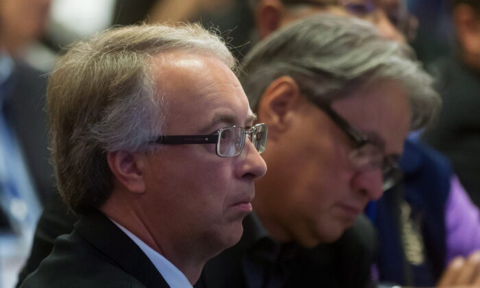 B.C. Minister of Aboriginal Relations and Reconciliation John Rustad (L) looks on during a gathering of First Nations leaders and B.C. cabinet ministers in Vancouver on Sept. 10, 2015. (The Canadian Press/Darryl Dyck)