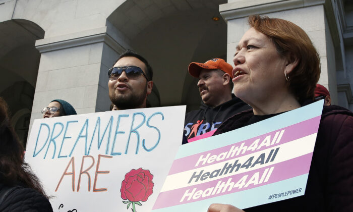 Supporters of proposals to expand California's government-funded health care benefits to illegal immigrants gather at the Capitol in Sacramento, on May 20, 2019. (Rich Pedroncelli/AP Photo)