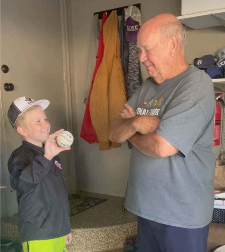 Boy Dedicates His First Home Run Baseball to Grandpa Who Coached Him:  'Papa, I Love You