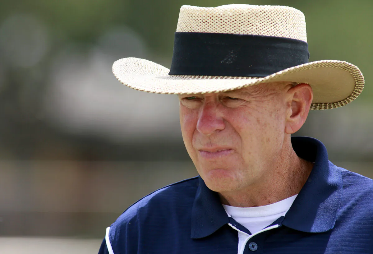 Odessa Permian head coach Gary Gaines walks off the practice field after a high school football workout in Odessa, Texas, on May 21, 2009. (Kevin Buehler/AP Photo)