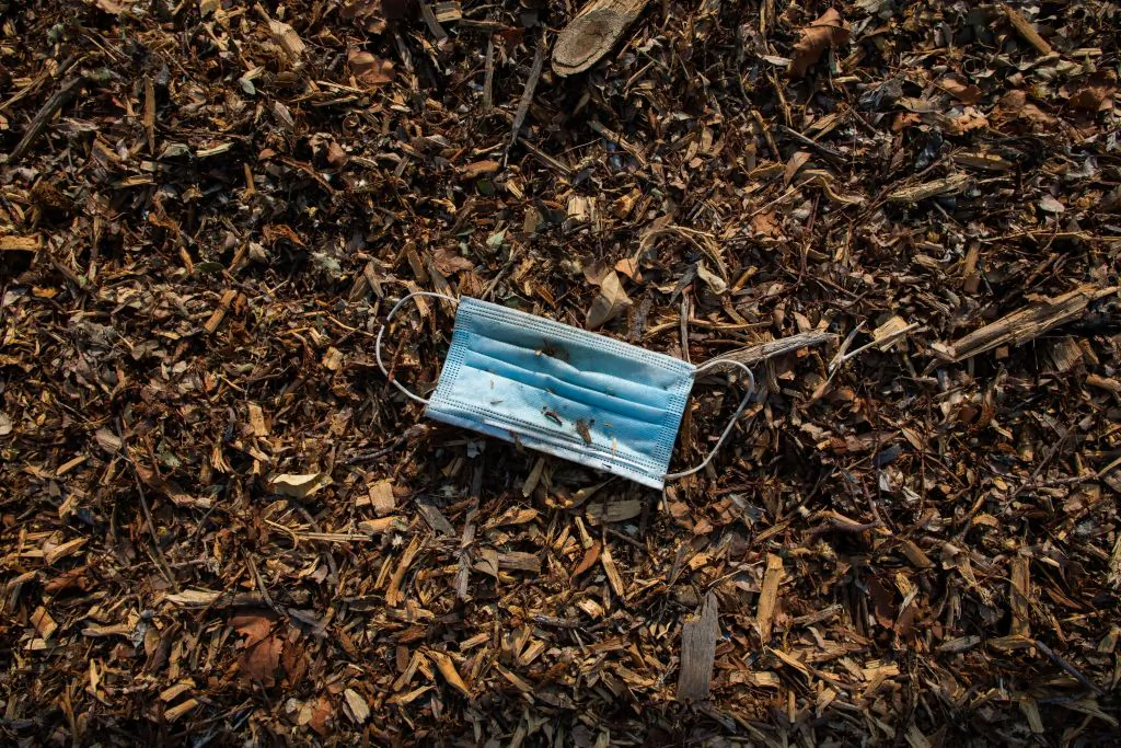 A discarded face mask is pictured on the sidewalk in Long Beach, Calif., on Aug. 22, 2020. (Apu Gomes/AFP via Getty Images)