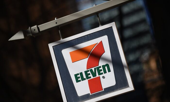 A sign hangs outside a 7-Eleven convenience store in Sydney on September 1, 2015. (Peter Parks/AFP via Getty Images)