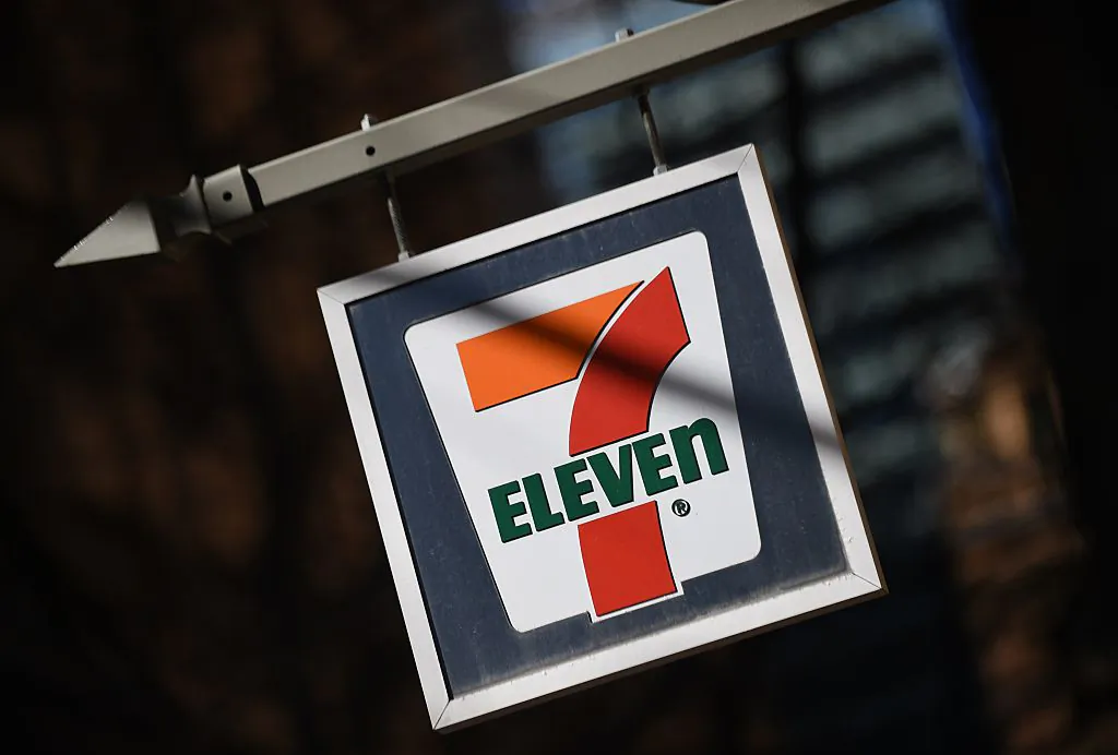 A sign hangs outside a 7-Eleven convenience store in Sydney on Sept. 1, 2015. (Peter Parks/AFP via Getty Images)