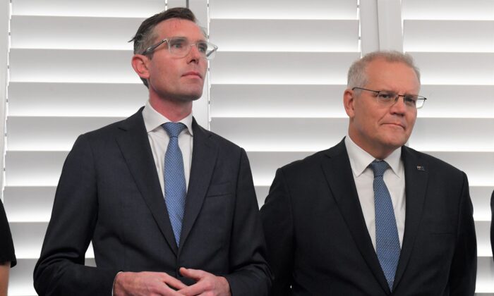 NSW Premier Dominic Perrottet and former Prime Minister Scott Morrison at a press conference on Day 30 of the 2022 federal election campaign, at the Epping Club in Sydney, Australia, on May 10, 2022. (AAP Image/Mick Tsikas)