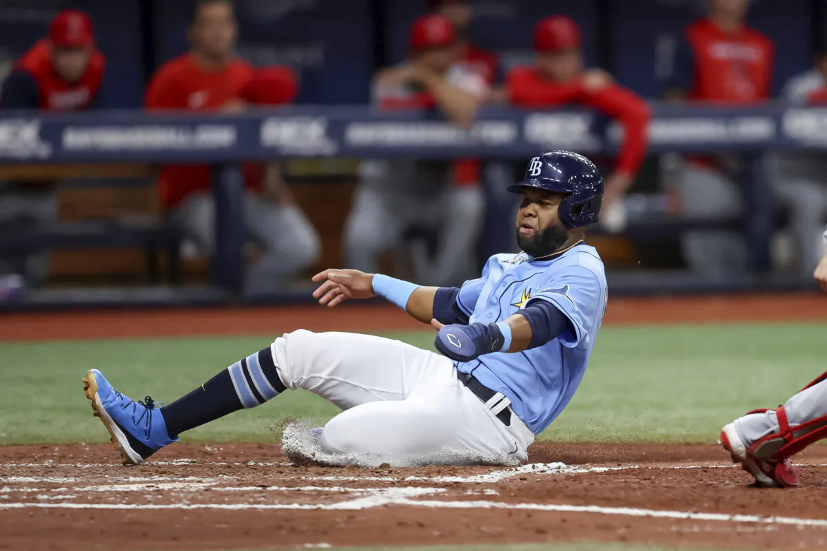 Tampa Bay Rays' Manuel Margot scores against the Los Angeles Angels during the third inning of a baseball game in St. Petersburg, Fla., Aug. 23, 2022. (Mike Carlson/AP Photo)