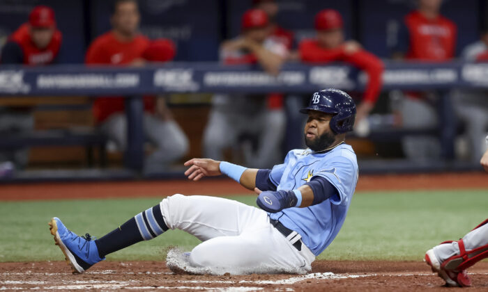 Tampa Bay Rays' Manuel Margot scores against the Los Angeles Angels during the third inning of a baseball game in St. Petersburg, Fla., Aug. 23, 2022. (Mike Carlson/AP Photo)