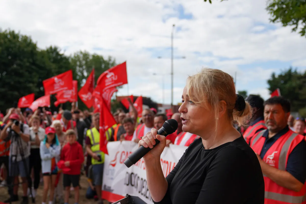 Unite General Secretary Sharon Graham speaks to her members on a picket line at one of the entrances to the Port of Felixstowe in Suffolk, England, on Aug. 24, 2022. (PA Media/Joe Giddens)