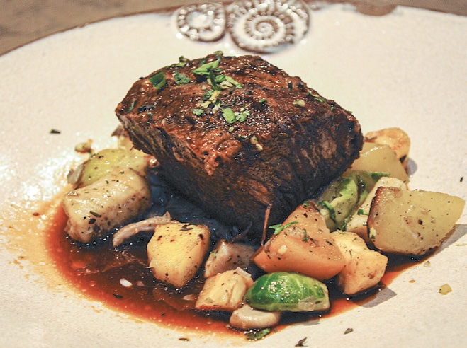 braised
short rib with root
vegetables, brussels
sprouts, and jus. (Karim Shamsi-Basha for American Essence)
