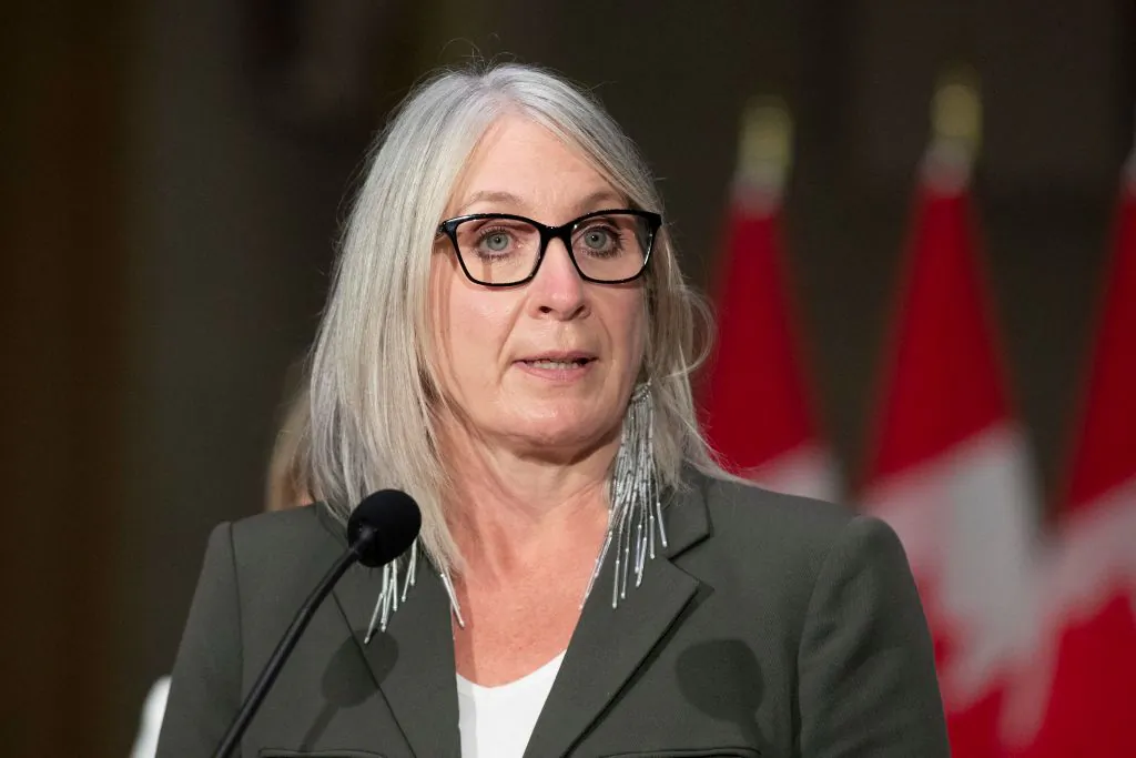 Patty Hajdu, newly sworn in as Minister of Indigenous Services and minister responsible for the Federal Economic Development Agency for Northern Ontario Patty Hajdu speaks during a press conference in Ottawa, Canada, on Oct. 26, 2021. (Lars Hagberg/AFP via Getty Images)