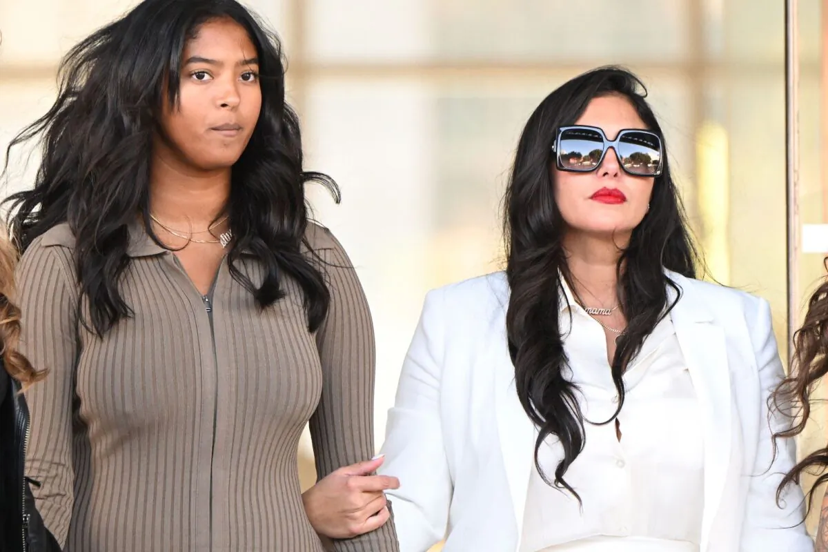 Vanessa Bryant (R), wife of the late Los Angeles Lakers basketball player Kobe Bryant, and her daughter Natalia Bryant depart the court house after a verdict was reached in Bryant's federal negligence lawsuit against Los Angeles County, in Los Angeles, Calif., on Aug. 24, 2022. (Patrick T. Fallon/AFP via Getty Images)