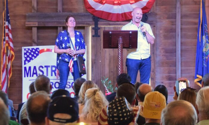 Pennsylvania state Sen. Doug Mastriano, Republican nominee for governor, and his wife, Rebbie, speak at a campaign rally at the Star Barn in Elizabethtown, Pa., on Aug. 24, 2022. (Beth Brelje/The Epoch Times)