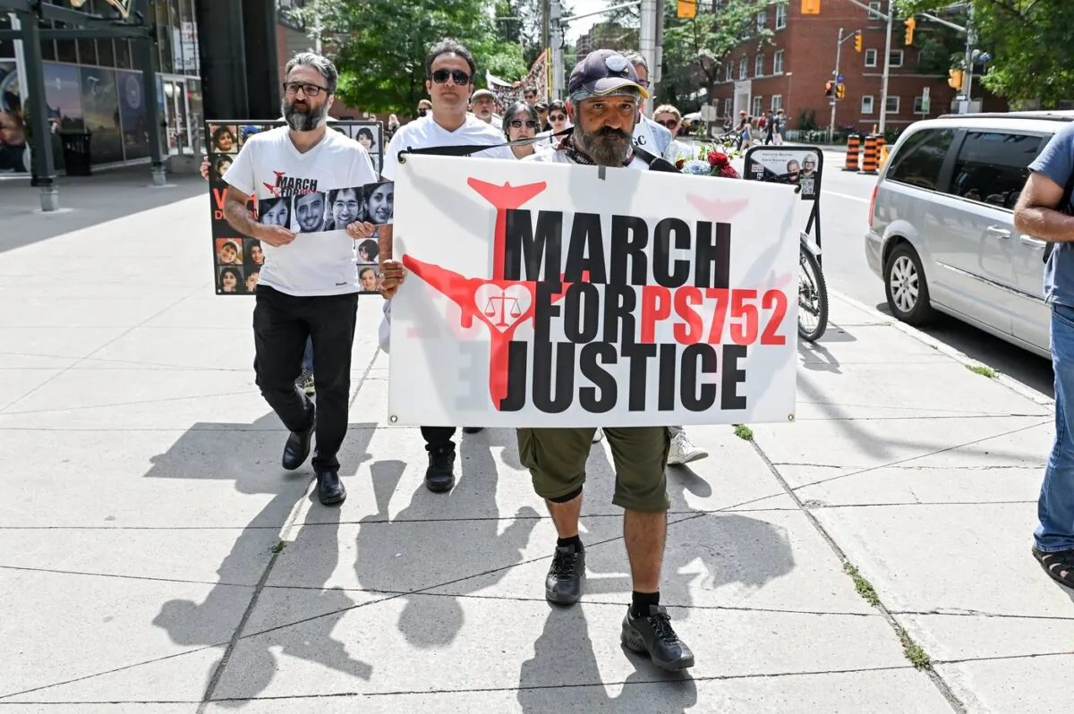 Mehrzad Zarei marches during a demonstration in Ottawa on Aug 25, 2022.
(The Canadian Press/Spencer Colby)