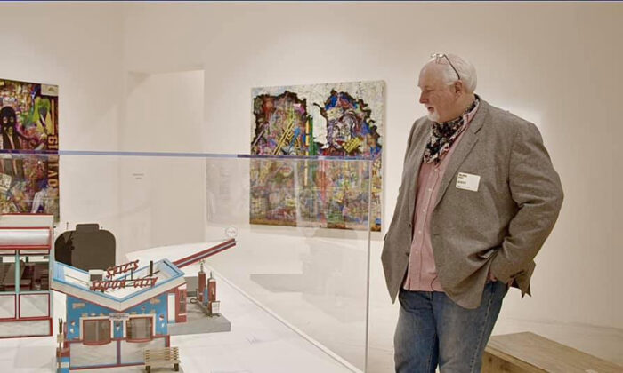 Dean Gillispie, an exonerated Ohio man, peruses some of his prison-created artwork on display at New York's Museum of Modern Art in April 2021. He and independent filmmaker Barry Rowen went there to shoot footage for a documentary about his life. (Photo courtesy of Barry Rowen)