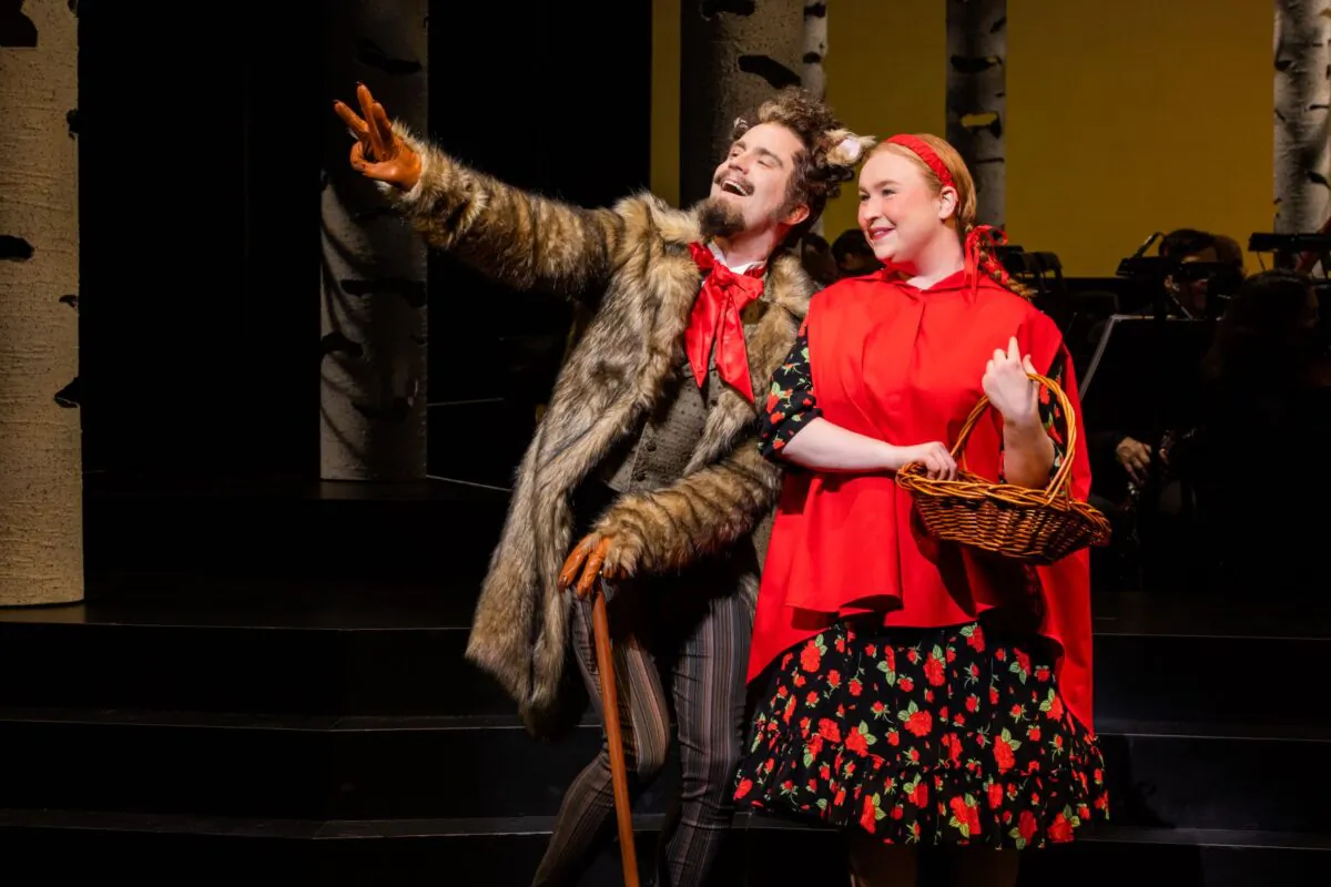 Gavin Creel as the Wolf and Julia Lester as the girl in red in “Into the Woods.” (Matthew Murphy and Evan Zimmerman)
