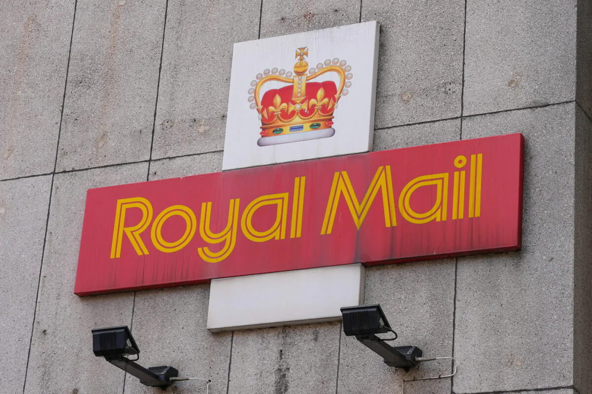 A Royal Mail sign is pictured outside a post delivery office in London on Aug. 26, 2022. (Maja Smiejkowska/Reuters)