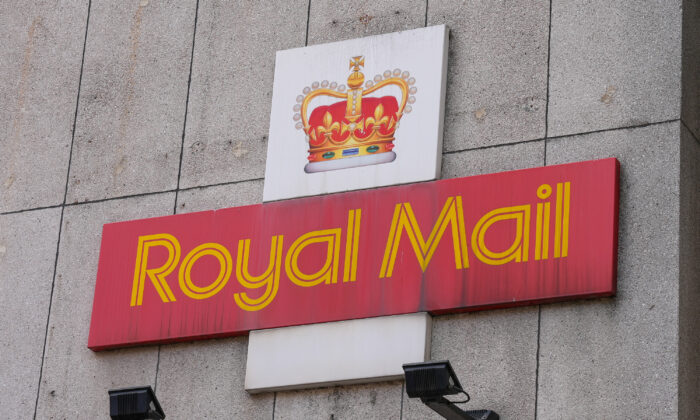 A Royal Mail sign is pictured outside a post delivery office in London on Aug. 26, 2022. (Maja Smiejkowska/Reuters)