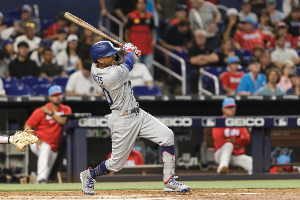 Mookie Betts (50) of the Los Angeles Dodgers hits a home run during the third inning against the Miami Marlins at loanDepot Park in Miami, Aug. 27,2022. (Bryan Cereijo/Getty Images)