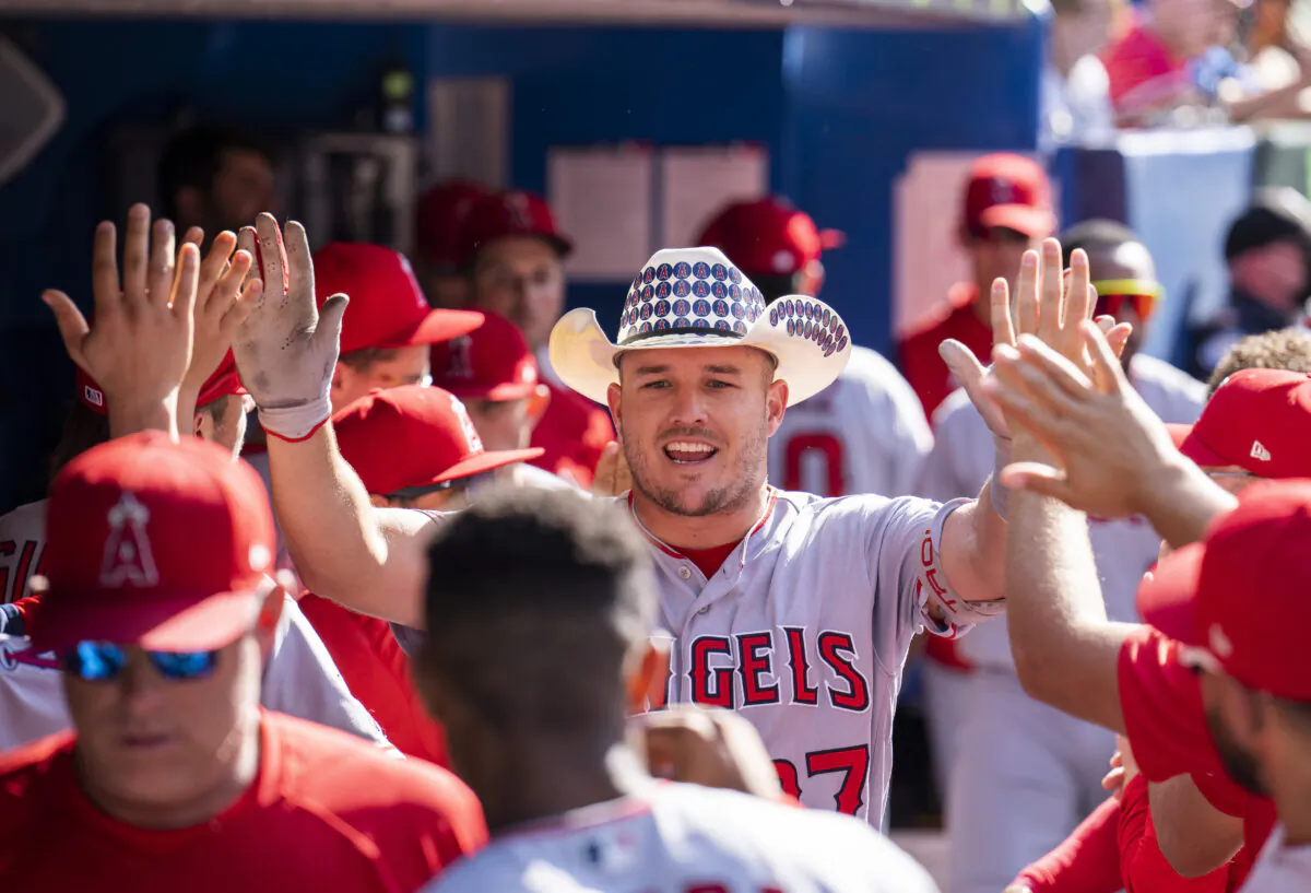 Mike Trout (27) of the Los Angeles Angels celebrates his home run against the Toronto Blue Jays in the ninth inning during their MLB game at the Rogers Centre in Toronto, Ontario, Canada, August 28, 2022, (Mark Blinch/Getty Images)