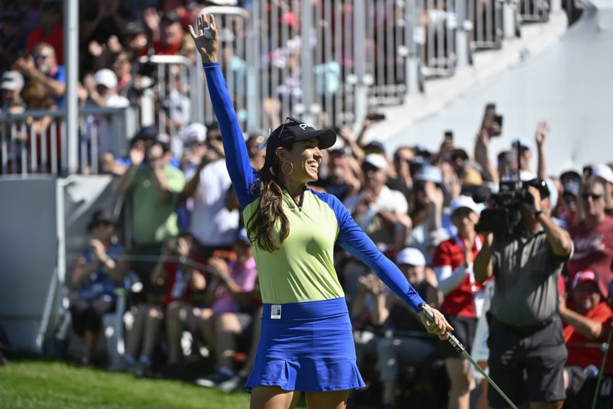 Paula Reto, of South Africa, celebrates after winning the the Canadian Pacific Women's Open golf tournament in Ottawa, Aug. 28, 2022. (Justin Tang/The Canadian Press via AP)