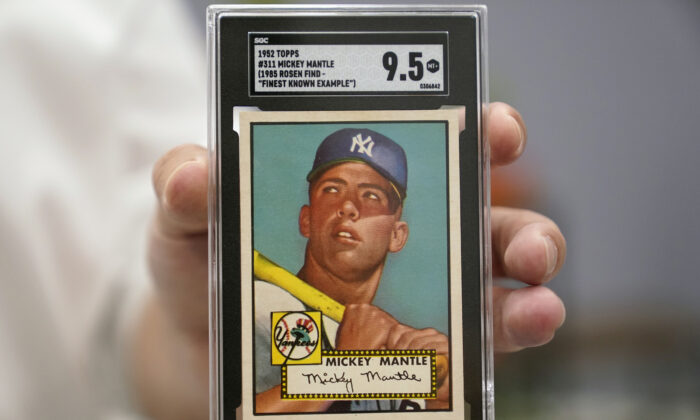 A Mickey Mantle baseball card at Heritage Auctions in Dallas on July 21, 2022. (LM Otero/AP Photo)