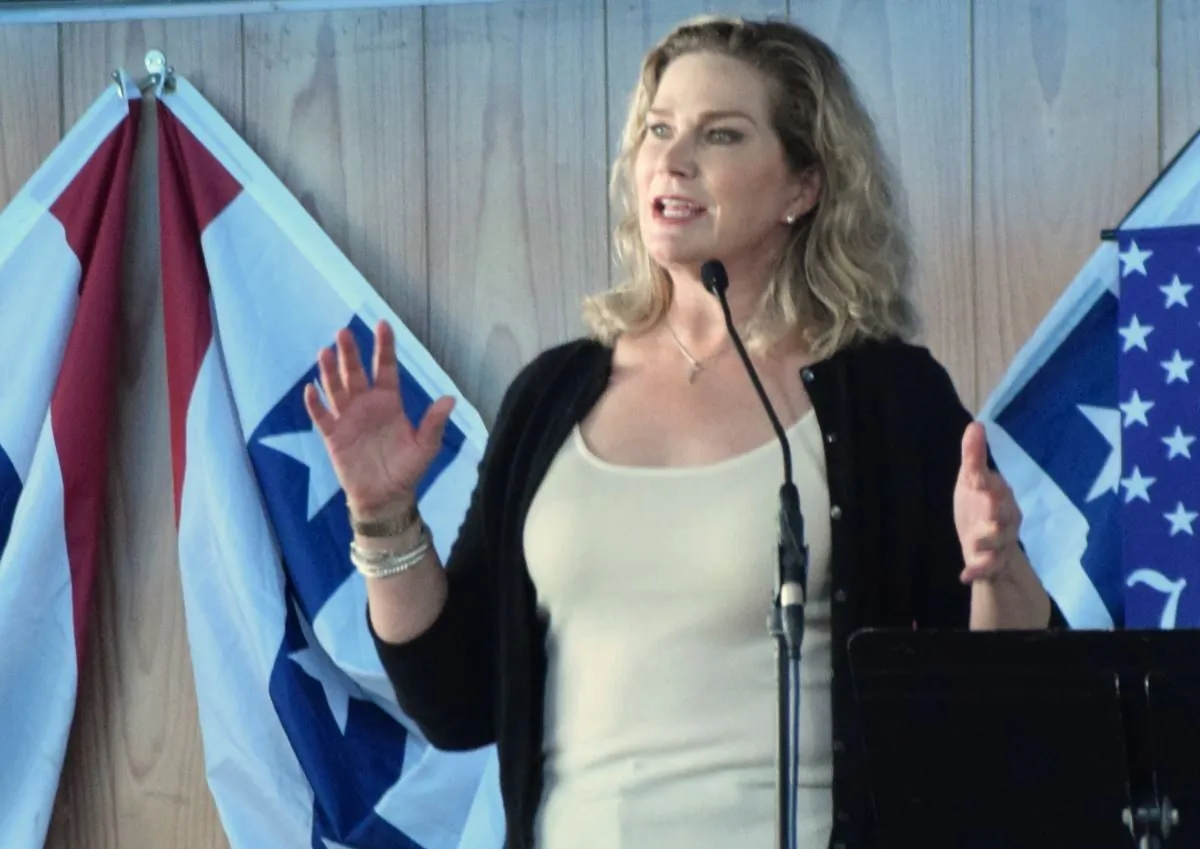 Catherine Engelbrecht, founder of True the Vote, speaks to a united coalition of more than 100 patriot groups gathered at Keystone Horse Center in Bloomsburg, Pa. to discuss election integrity on Aug. 27, 2022. (Beth Brelje/The Epoch Times)