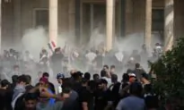 Clashes Erupt After Iraqi Shiite Cleric Resigns, at Least 15 Dead