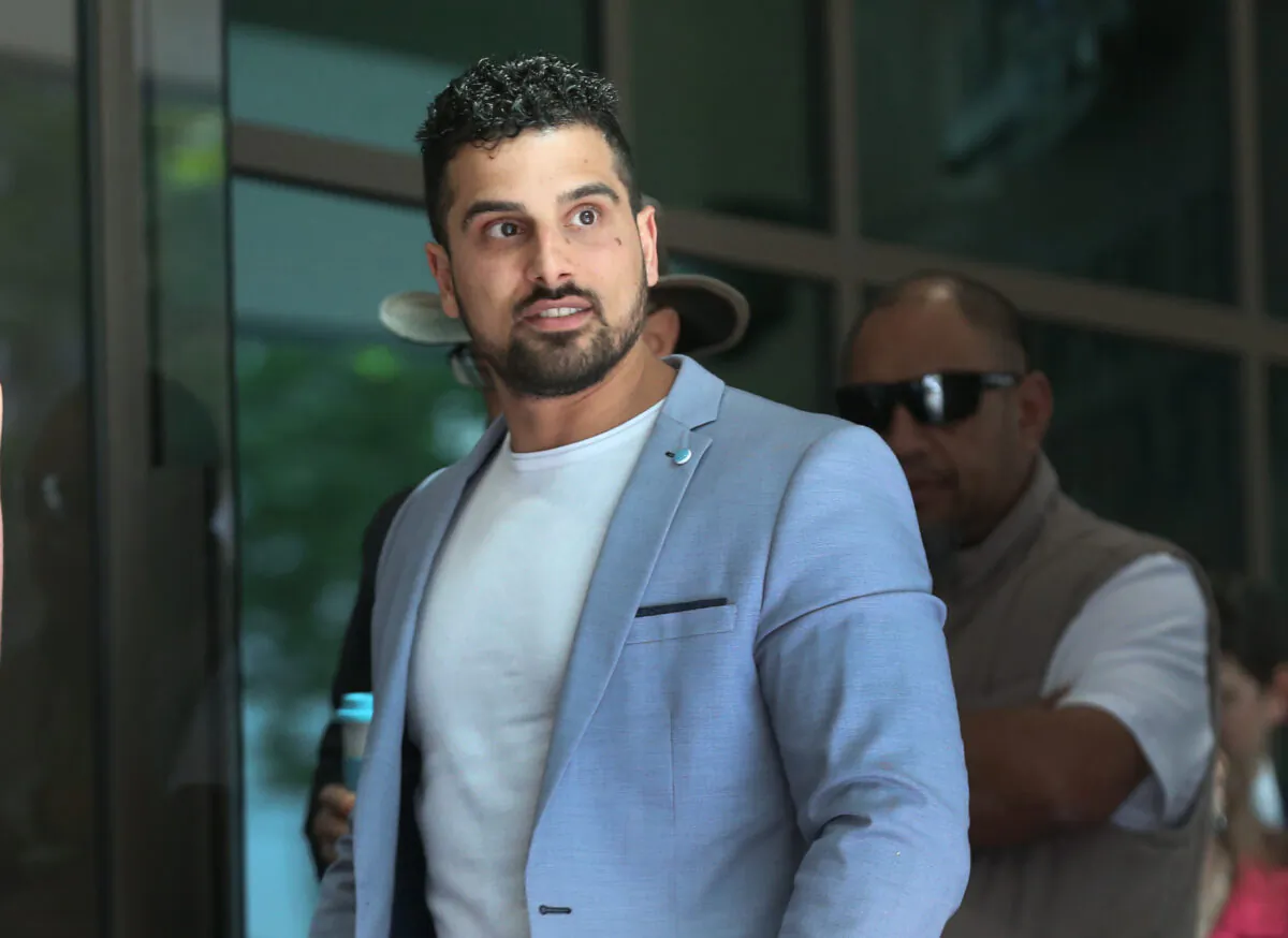 Avi Yemini arrives at the Melbourne Magistrates in Melbourne, Australia, on Nov. 6, 2019. (AAP Image/David Crosling)