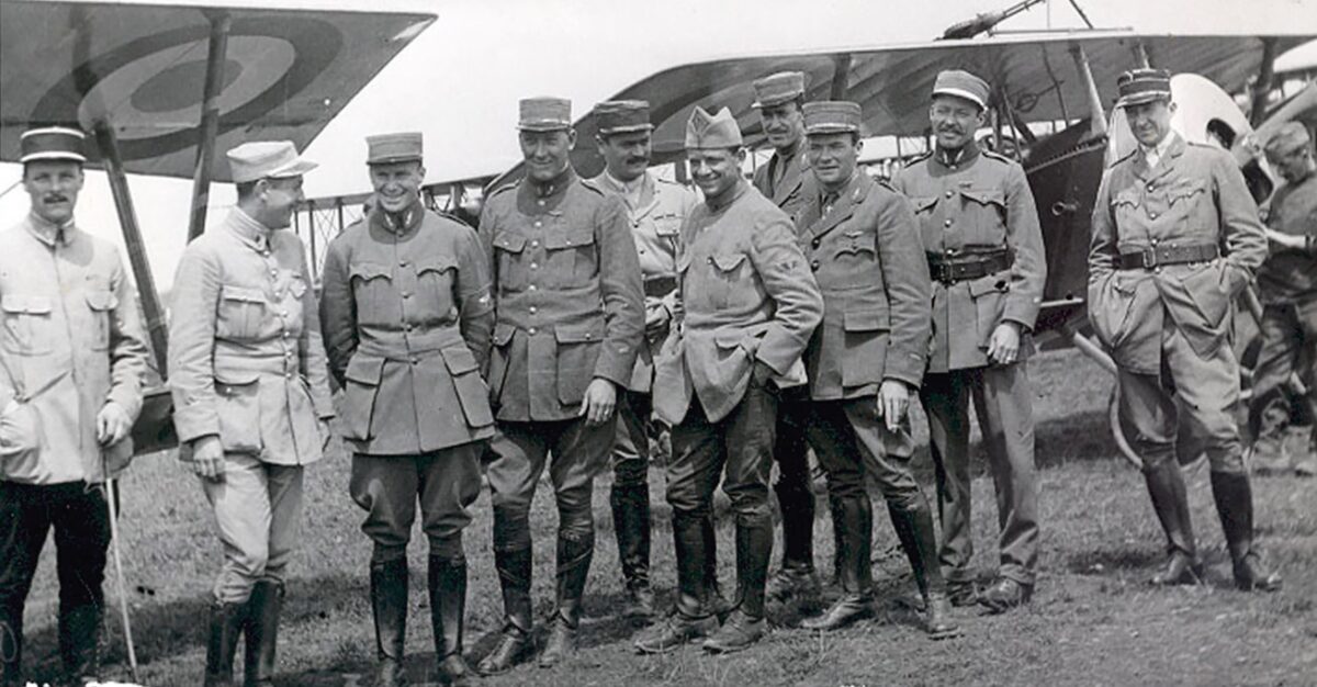 The
Lafayette Escadrille
crew poses with a
French lieutenant
(leftmost) at
Behonne Aerodrome
near Bar-le-Duc,
Verdun sector of the
Western Front, July
1916. Kiffin Rockwell
is fourth from right. (Public Domain)