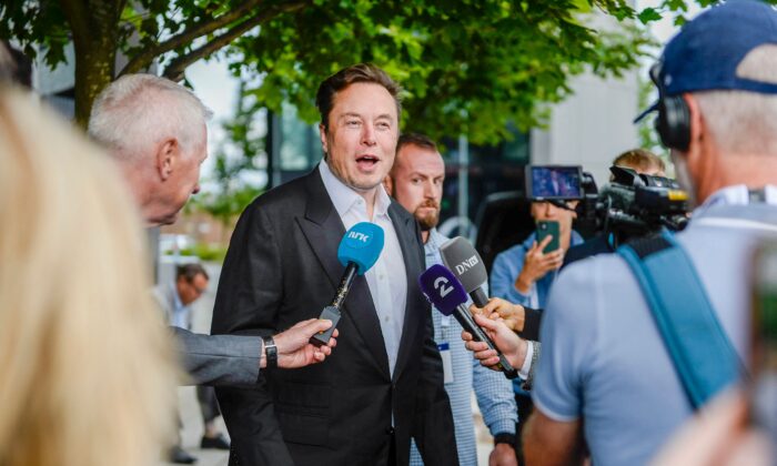 Tesla CEO Elon Musk gives interviews as he arrives at the Offshore Northern Seas 2022 meeting in Stavanger, Norway on Aug. 29, 2022. (Carina Johansen/NTB/AFP via Getty Images)