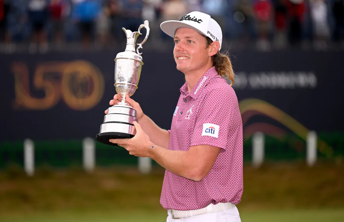 Cameron Smith of Australia celebrates with the Claret Jug on the 18th green after the final round of The 150th Open at St Andrews Old Course on July 17, 2022 in St Andrews, Scotland. (Photo by Ross Kinnaird/Getty Images)