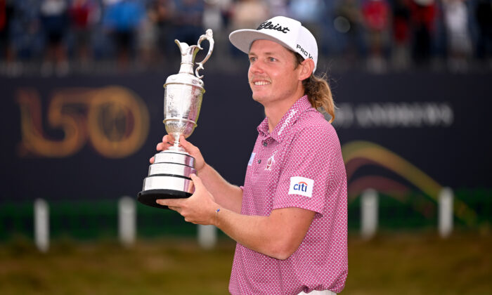 Cameron Smith of Australia celebrates with the Claret Jug on the 18th green after the final round of The 150th Open at St Andrews Old Course on July 17, 2022 in St Andrews, Scotland. (Photo by Ross Kinnaird/Getty Images)