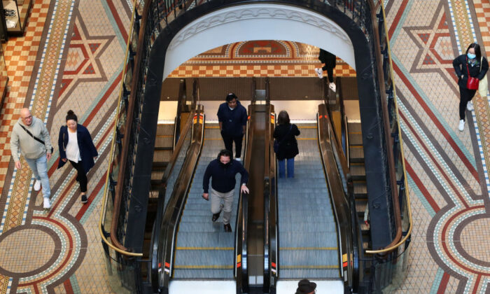 Shoppers make their way through the Queen Victoria Building in Sydney, Australia, on Aug. 16, 2022. (Lisa Maree Williams/Getty Images)