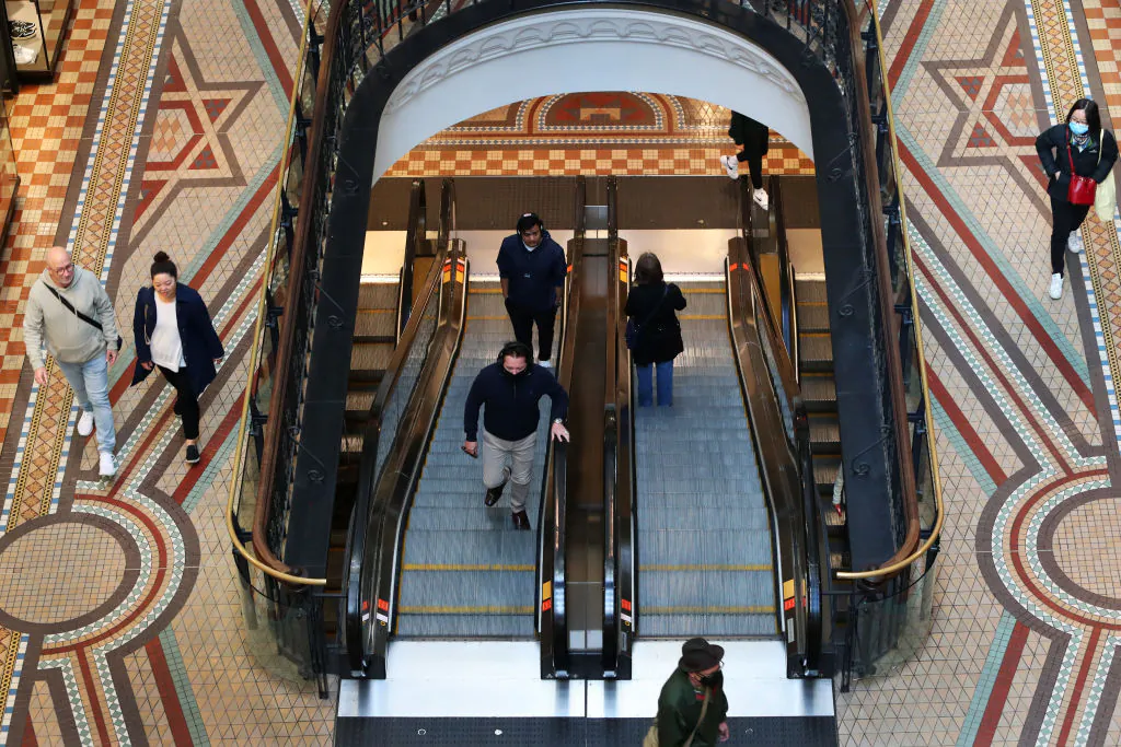 Shoppers make their way through the Queen Victoria Building in Sydney, Australia, on Aug. 16, 2022. (Lisa Maree Williams/Getty Images)