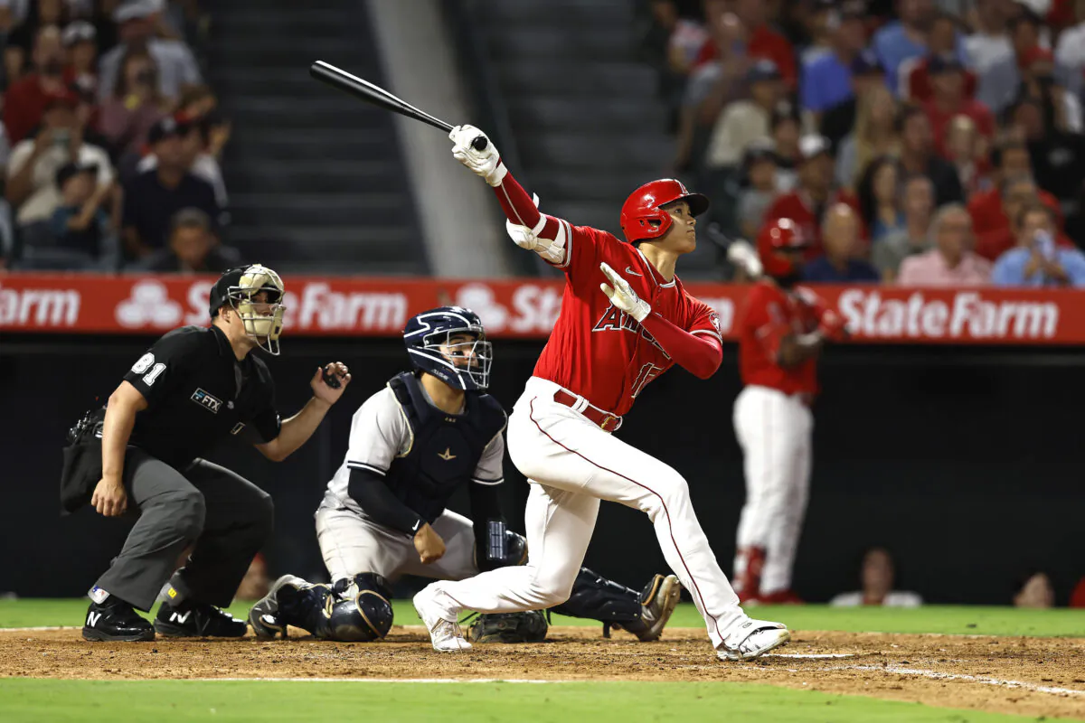 Shohei Ohtani (17) of the Los Angeles Angels hits a two-run home run against the New York Yankees during the fifth inning at Angel Stadium of Anaheim in Anaheim, Aug. 29, 2022. (Michael Owens/Getty Images)
