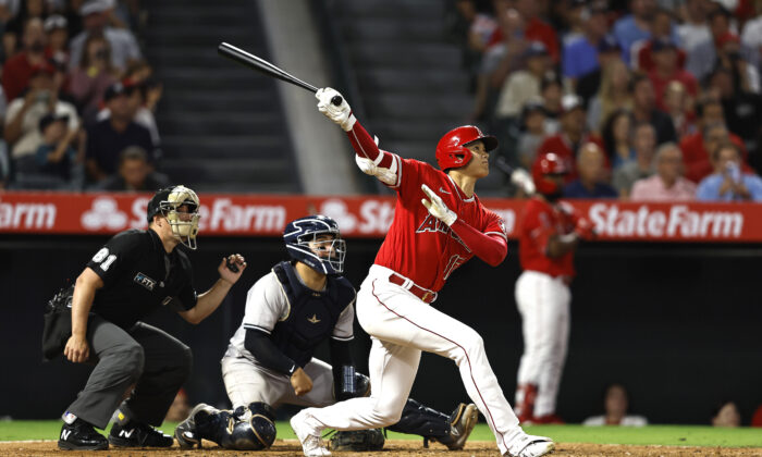 Shohei Ohtani (17) of the Los Angeles Angels hits a two-run home run against the New York Yankees during the fifth inning at Angel Stadium of Anaheim in Anaheim, Aug. 29, 2022. (Michael Owens/Getty Images)