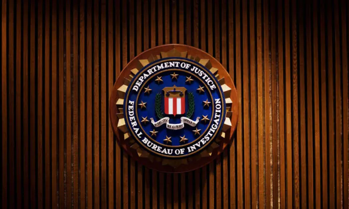 A crest of the Federal Bureau of Investigation inside the J. Edgar Hoover FBI Building in Washington, DC, on Aug. 3, 2007. (MANDEL NGAN/AFP via Getty Images)