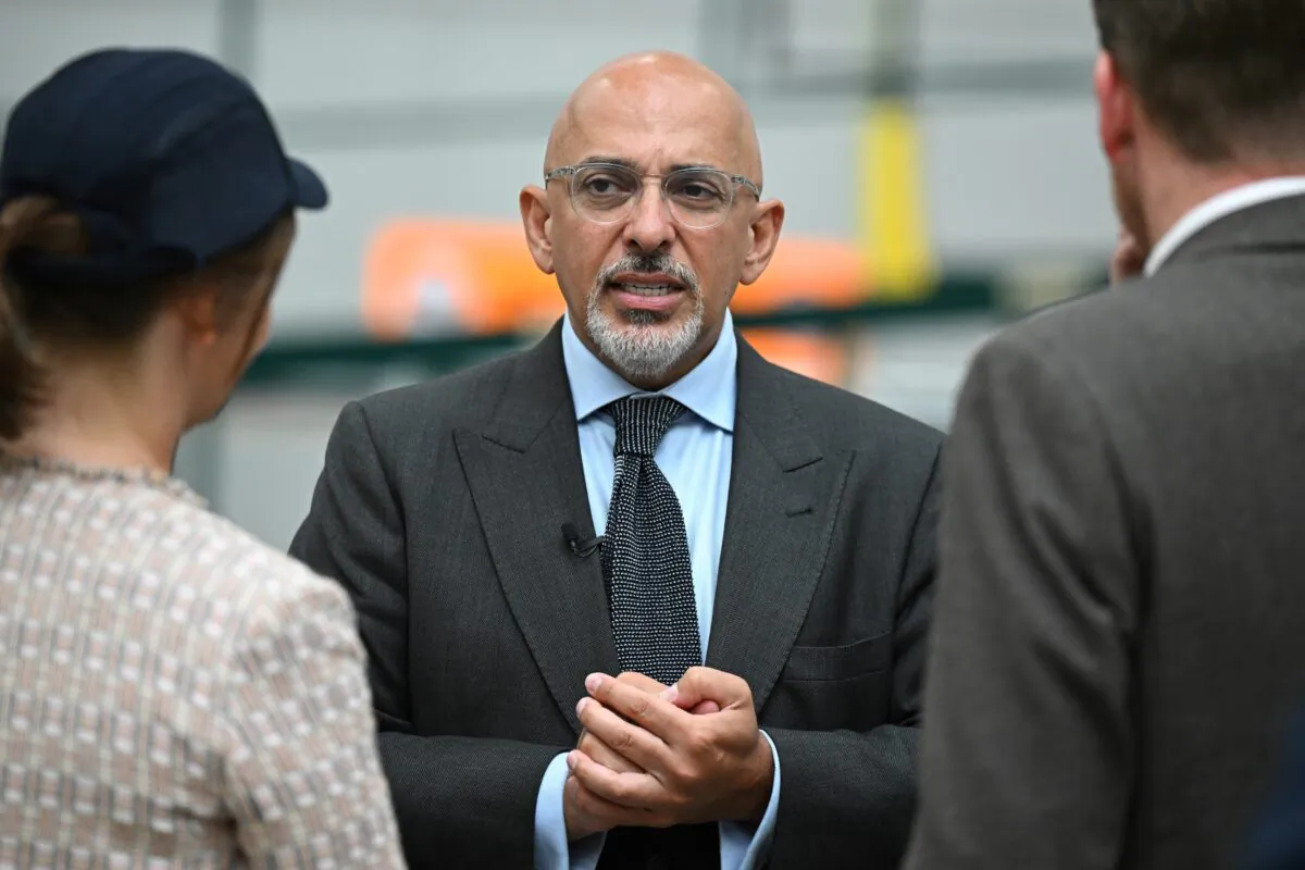 Britain's Chancellor of the Exchequer Nadhim Zahawi (C) visits Broughton Airbus plant in Chester, England, on Aug. 12, 2022. (Oli Scarff—WPA Pool/Getty Images)